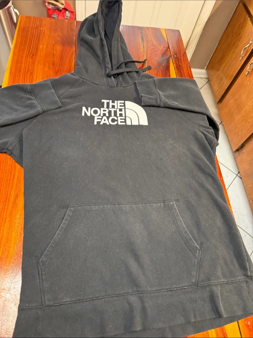 The North Face Black Hoodie with White Logo